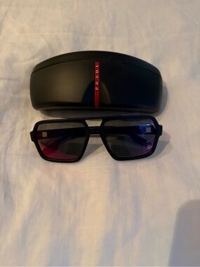 Prada linea rossa Black Frame Sunglasses with Red Gradient Lenses